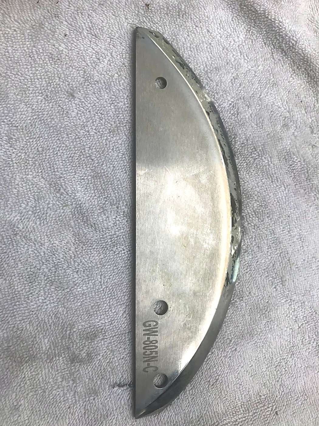 Processor blades before sharpening — visible wear along the cutting edge.
